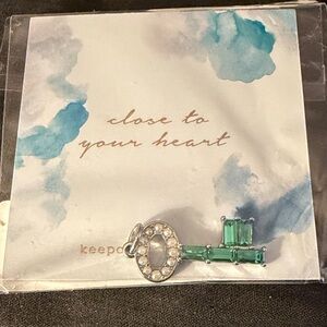 Silver Key Pendant with Green Gems